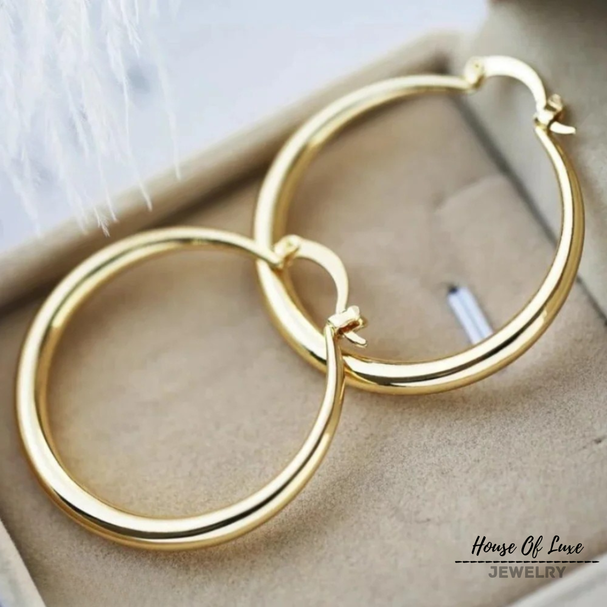 Penelope® | Goldene große Creolen Ohrringe