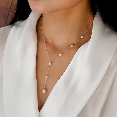 Aris® | Elegante Rubinkette & Halskette mit Margeriten