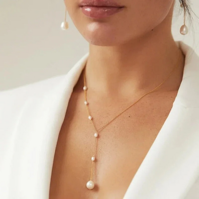 Aris® | Elegante Rubinkette & Halskette mit Margeriten